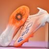 Zapatillas de fútbol para jóvenes AG/FG de caña baja, preferidas para césped artificial duro, competición en campos exteriore 1