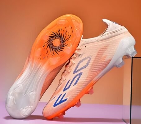Zapatillas de fútbol para jóvenes AG/FG de caña baja, preferidas para césped artificial duro, competición en campos exteriore